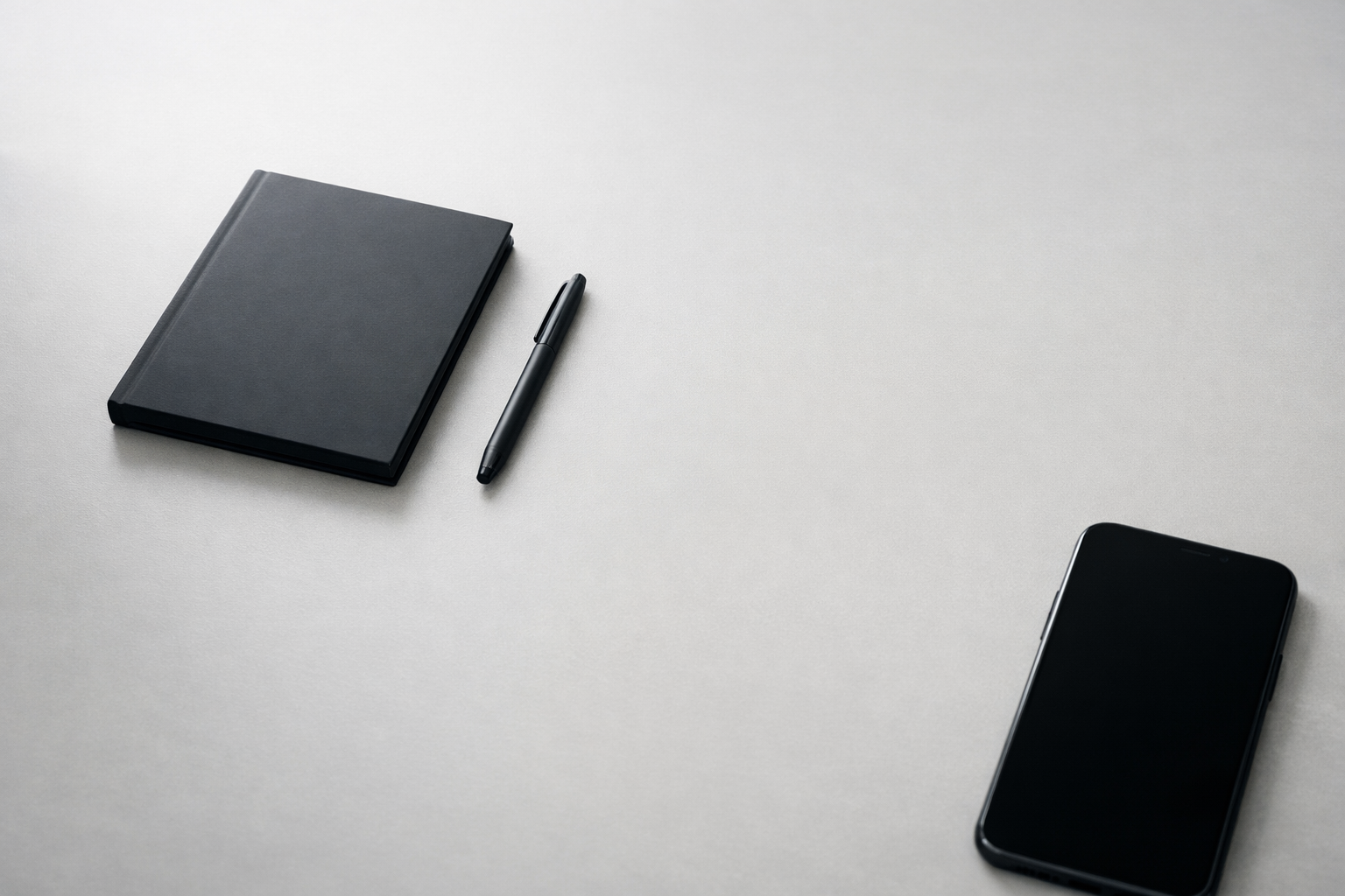 Minimal desk scene representing a credibility-first Teach-Prove-Offer content strategy for professionals and law firms